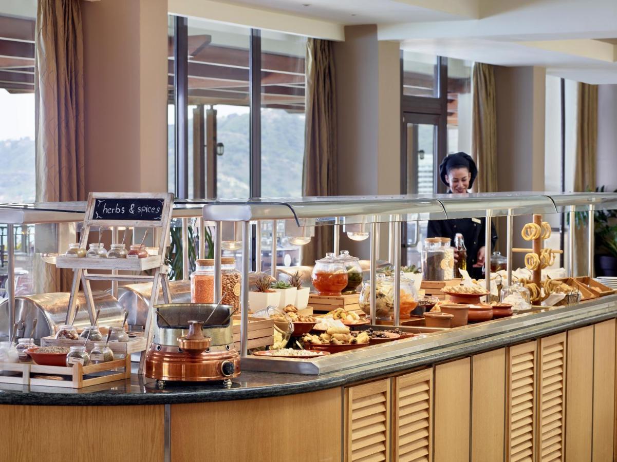 Amus Hotel & Spa Ixia  Ngoại thất bức ảnh A buffet at a hotel