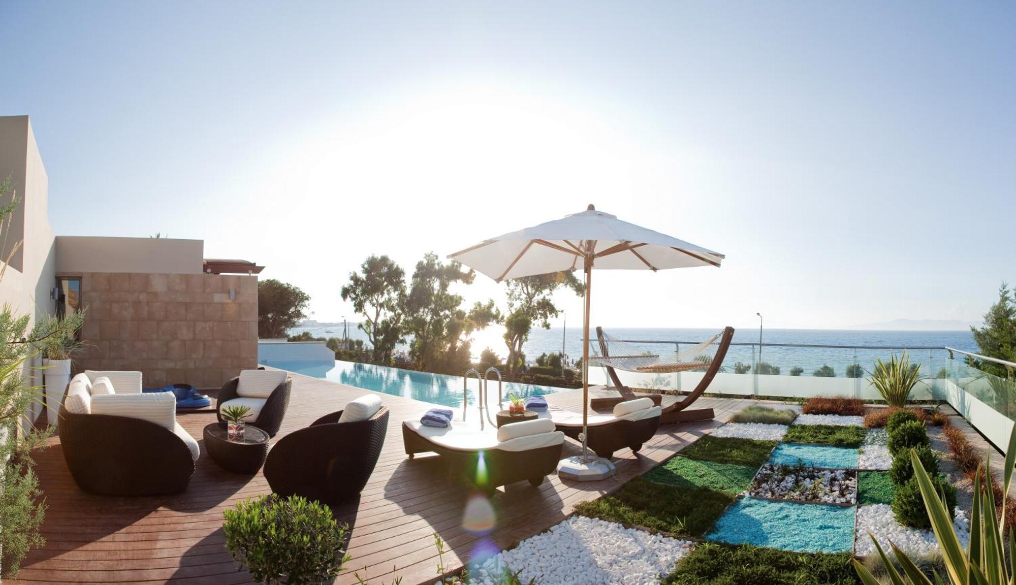 Amus Hotel & Spa Ixia  Ngoại thất bức ảnh The pool at the hotel